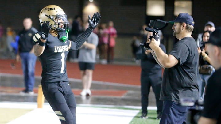 Penn receiver Tayshon Bardo (1) celebrates with the student body after a touchdown Friday, Aug. 23, 2024, at the Valparaiso vs. Penn football game at Freed Field.