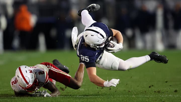 Penn State tight end Luke Reynolds is tackled by Nebraska wide receiver Jacory Barney Jr on a successful fake punt during the fourth quarter.