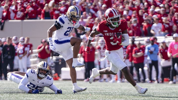 Indiana Hoosiers wide receiver Omar Cooper Jr. (3) runs the ball for a touchdown during the second quarter against the Washington Huskies at Memorial Stadium. Indiana Hoosiers wide receiver Omar Cooper Jr. (3) runs the ball for a touchdown during the second quarter against the Washington Huskies at Memorial Stadium.