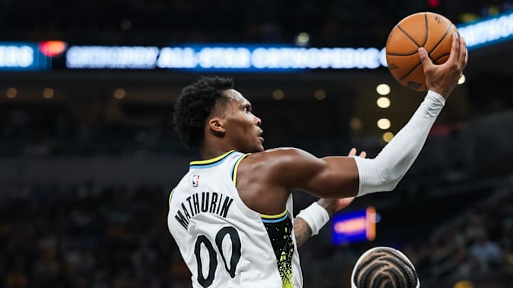 Apr 22, 2025; Indianapolis, Indiana, USA; Indiana Pacers guard Bennedict Mathurin (00) shoots the ball while Milwaukee Bucks guard Gary Trent Jr. (5) defends during game two of first round for the 2024 NBA Playoffs at Gainbridge Fieldhouse. Mandatory Credit: Trevor Ruszkowski-Imagn Images Apr 22, 2025; Indianapolis, Indiana, USA; Indiana Pacers guard Bennedict Mathurin (00) shoots the ball while Milwaukee Bucks guard Gary Trent Jr. (5) defends during game two of first round for the 2024 NBA Playoffs at Gainbridge Fieldhouse. Mandatory Credit: Trevor Ruszkowski-Imagn Images