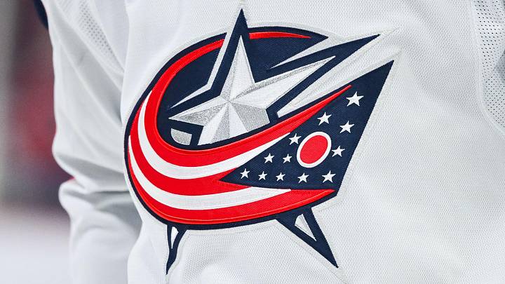 Mar 12, 2024; Montreal, Quebec, CAN; View of a Columbus Blue Jackets logo on a jersey worn by a member of the team during warm-up before the game against the Montreal Canadiens at Bell Centre. Mar 12, 2024; Montreal, Quebec, CAN; View of a Columbus Blue Jackets logo on a jersey worn by a member of the team during warm-up before the game against the Montreal Canadiens at Bell Centre.