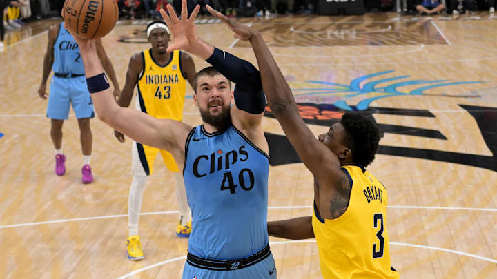 Feb 6, 2025; Inglewood, California, USA;  Los Angeles Clippers center Ivica Zubac (40) is defended by Indiana Pacers center Thomas Bryant (3) in the first half at Intuit Dome. Mandatory Credit: Jayne Kamin-Oncea-Imagn Images