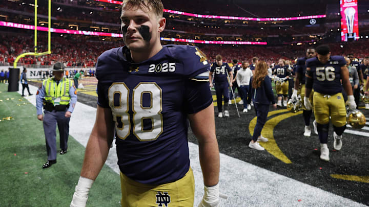Jan 20, 2025; Atlanta, GA, USA; Notre Dame Fighting Irish tight end Mitchell Evans (88) reacts after losing against the Ohio State Buckeyes in the CFP National Championship college football game at Mercedes-Benz Stadium. 