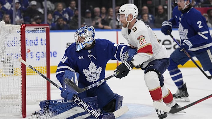 May 5, 2025; Toronto, Ontario, CAN; Toronto Maple Leafs goaltender Anthony Stolarz (41) and Florida Panthers forward Sam Bennett (9) battle for position in front of the goal during the second period of the second round of the 2025 Stanley Cup Playoffs at Scotiabank Arena. Mandatory Credit: John E. Sokolowski-Imagn Images