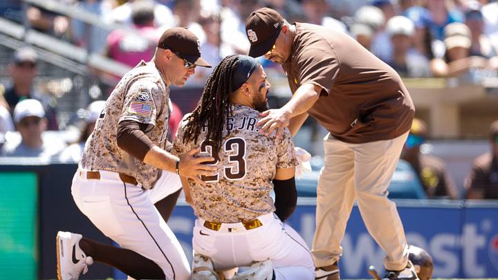Jun 28, 2026; San Diego, California, USA; San Diego Padres right fielder Fernando Tatis Jr. (23) is looked at by training staff after being hit by a pitch during the fifth inning against the Los Angeles Dodgers at Petco Park. Mandatory Credit: David Frerker-Imagn Images Jun 28, 2026; San Diego, California, USA; San Diego Padres right fielder Fernando Tatis Jr. (23) is looked at by training staff after being hit by a pitch during the fifth inning against the Los Angeles Dodgers at Petco Park. Mandatory Credit: David Frerker-Imagn Images