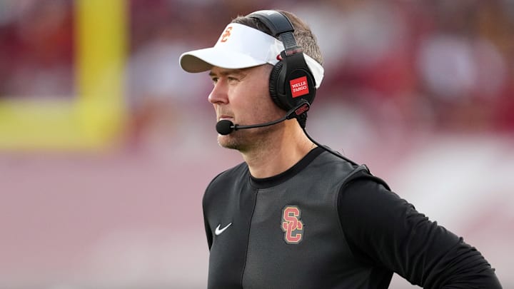 Aug 30, 2025; Los Angeles, California, USA; Southern California Trojans head coach Lincoln Riley watches from the sidelines against the Missouri State Bears in the first half at United Airlines Field at Los Angeles Memorial Coliseum. Mandatory Credit: Kirby Lee-Imagn Images