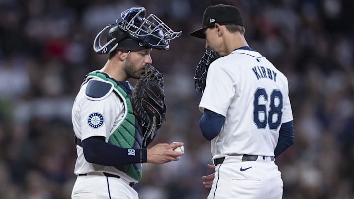Seattle Mariners catcher Mitch Garver (left) and pitcher George Kirby meet on the mound during a game against the Texas Rangers on June 15 at T-Mobile Park. Seattle Mariners catcher Mitch Garver (left) and pitcher George Kirby meet on the mound during a game against the Texas Rangers on June 15 at T-Mobile Park.