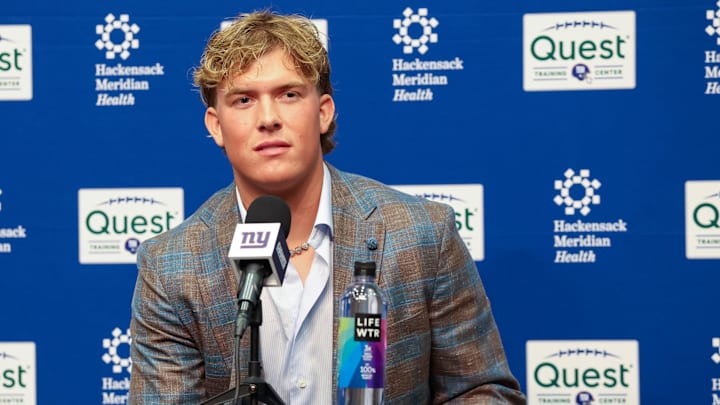 Apr 25, 2025; East Rutherford, NJ, US;  New York Giants first-round draft pick, Jaxson Dart, takes questions from the media during his introduction press conference.  