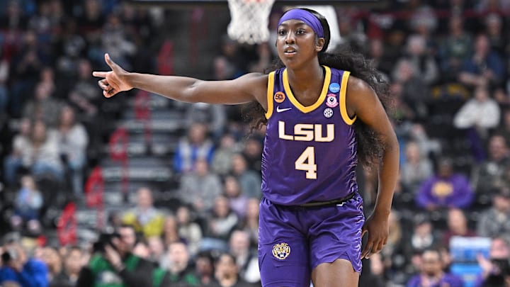 Mar 30, 2025; Spokane, WA, USA; LSU Lady Tigers guard Flau'Jae Johnson (4) reacts after play against the UCLA Bruins during the first half of a Elite 8 NCAA Tournament basketball game at Spokane Arena. Mandatory Credit: James Snook-Imagn Images Mar 30, 2025; Spokane, WA, USA; LSU Lady Tigers guard Flau'Jae Johnson (4) reacts after play against the UCLA Bruins during the first half of a Elite 8 NCAA Tournament basketball game at Spokane Arena. Mandatory Credit: James Snook-Imagn Images
