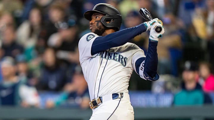 Seattle Mariners right fielder Victor Robles hits a double against the Detroit Tigers on April 2 at T-Mobile Park.
