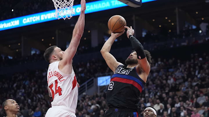 Feb 11, 2026; Toronto, Ontario, CAN; Toronto Raptors forward Sandro Mamukelashvili (54) tries to block a shot by Detroit Pistons guard Cade Cunningham (2) during the first half at Scotiabank Arena. Mandatory Credit: John E. Sokolowski-Imagn Images Feb 11, 2026; Toronto, Ontario, CAN; Toronto Raptors forward Sandro Mamukelashvili (54) tries to block a shot by Detroit Pistons guard Cade Cunningham (2) during the first half at Scotiabank Arena. Mandatory Credit: John E. Sokolowski-Imagn Images