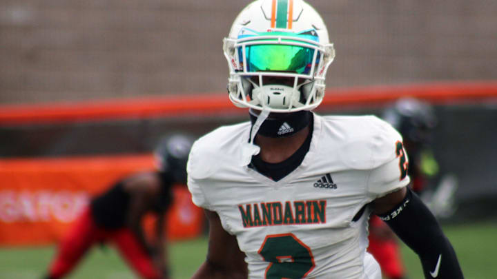 Mandarin wide receiver Jaime Ffrench Jr. (2) runs through warm-ups before the FHSAA Class 4M high