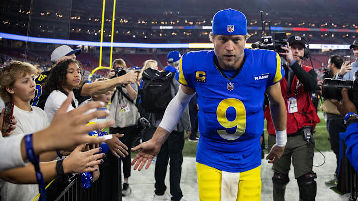 Jan 13, 2025; Glendale, AZ, USA; Los Angeles Rams quarterback Matthew Stafford (9) against the Minnesota Vikings during an NFC wild card game at State Farm Stadium. Mandatory Credit: Mark J. Rebilas-Imagn Images