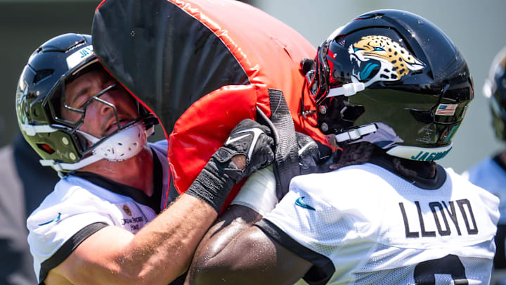 Jacksonville Jaguars linebacker Chad Muma (48) makes a run Jacksonville Jaguars linebacker Devin Lloyd (0) during the fourth organized team activity at the Miller Electric Center in Jacksonville, Fla. Tuesday, May 27, 2025. [Doug Engle/Florida Times-Union]