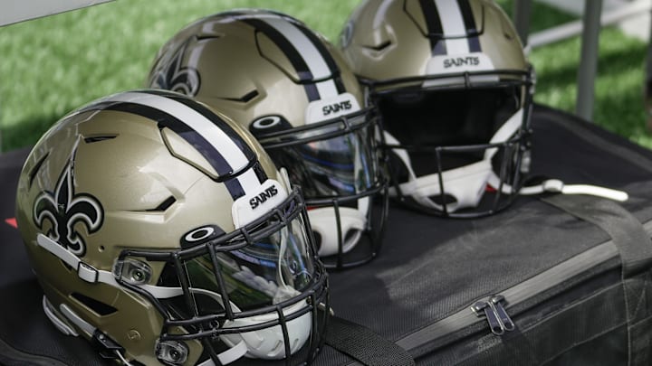Sep 19, 2021; Charlotte, North Carolina, USA; New Orleans Saints helmets during the pregame action between the Carolina Panthers and the New Orleans Saints at Bank of America Stadium. Mandatory Credit: Jim Dedmon-Imagn Images