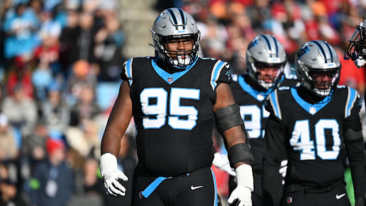 Jan 7, 2024; Charlotte, North Carolina, USA;  Carolina Panthers defensive tackle Derrick Brown (95) reacts in the third quarter at Bank of America Stadium. Mandatory Credit: Bob Donnan-Imagn Images