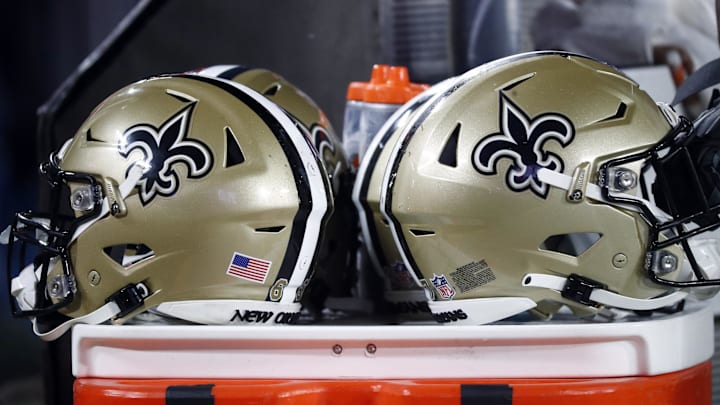 Dec 19, 2021; Tampa, Florida, USA; A detail view of New Orleans Saints helmets against the Tampa Bay Buccaneers during the second half at Raymond James Stadium. Mandatory Credit: Kim Klement-Imagn Images