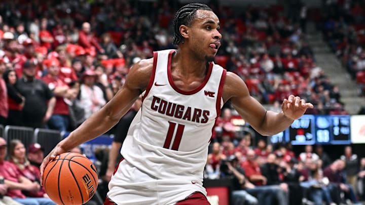 Jan 15, 2026; Pullman, Washington, USA; Washington State Cougars guard Jerone Morton (11) controls the ball against the Gonzaga Bulldogs in the second half at Friel Court at Beasley Coliseum. Mandatory Credit: James Snook-Imagn Images