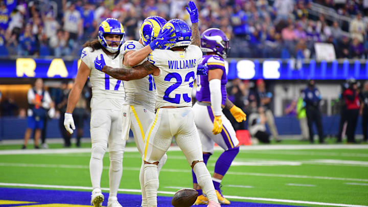 Oct 24, 2024; Inglewood, California, USA; Los Angeles Rams running back Kyren Williams (23) celebrates his touchdown scored against the Minnesota Vikings with wide receiver Cooper Kupp (10) and wide receiver Puka Nacua (17) during the first half at SoFi Stadium. Mandatory Credit: Gary A. Vasquez-Imagn Images