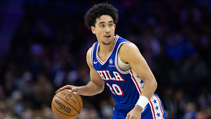 Dec 4, 2024; Philadelphia, Pennsylvania, USA; Philadelphia 76ers guard Jared McCain (20) controls the ball against the Orlando Magic during the fourth quarter at Wells Fargo Center. Mandatory Credit: Bill Streicher-Imagn Images
