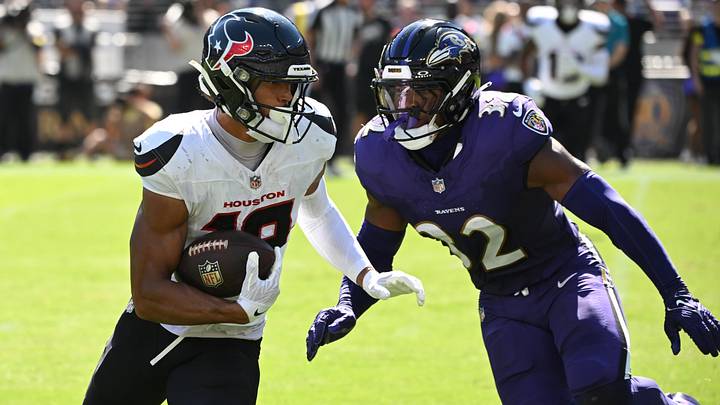 Oct 5, 2025; Baltimore, Maryland, USA; Houston Texans wide receiver Xavier Hutchinson (19) runs for a gain past Baltimore Ravens linebacker Trenton Simpson (32) during the second quarter at M&T Bank Stadium. Mandatory Credit: Rafael Suanes-Imagn Images Oct 5, 2025; Baltimore, Maryland, USA; Houston Texans wide receiver Xavier Hutchinson (19) runs for a gain past Baltimore Ravens linebacker Trenton Simpson (32) during the second quarter at M&T Bank Stadium. Mandatory Credit: Rafael Suanes-Imagn Images