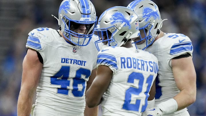Detroit Lions cornerback Amik Robertson (21) and linebacker Trevor Nowaske (53) 