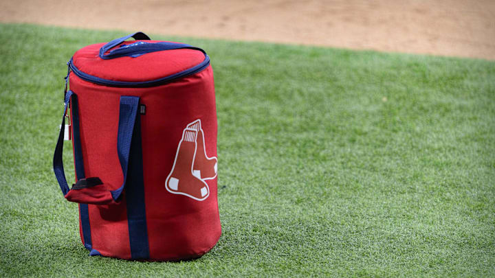 Apr 29, 2021; Arlington, Texas, USA; A view of the Boston Red Sox logo and a field bag during batting practice before the game between the Texas Rangers and the Boston Red Sox at Globe Life Field. Mandatory Credit: Jerome Miron-Imagn Images Apr 29, 2021; Arlington, Texas, USA; A view of the Boston Red Sox logo and a field bag during batting practice before the game between the Texas Rangers and the Boston Red Sox at Globe Life Field. Mandatory Credit: Jerome Miron-Imagn Images