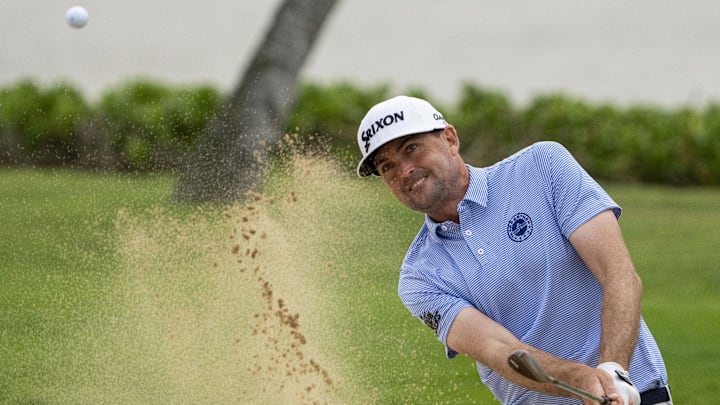 January 11, 2024; Honolulu, Hawaii, USA; Keegan Bradley hits his bunker shot on the 17th hole during