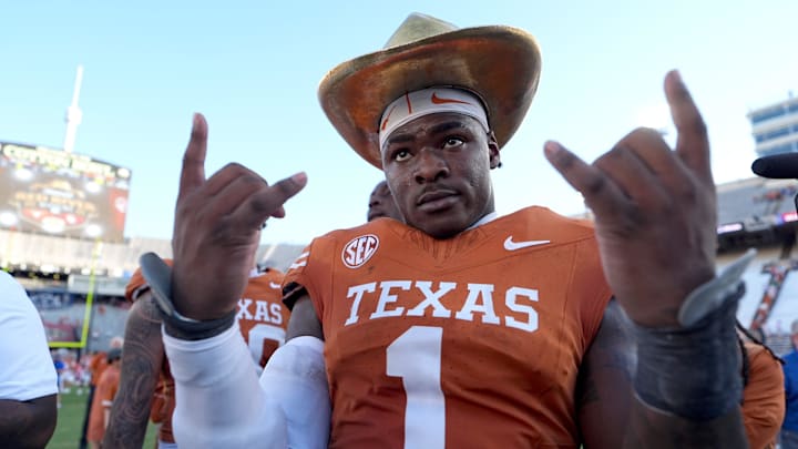 Texas Longhorns defensive end Colin Simmons (1) celebrates with the golden hat following the Red River Rivalry college football game between the University of Oklahoma Sooners and the Texas Longhorn at the Cotton Bowl Stadium in Dallas, Texas, Saturday, Oct. 11, 2025.