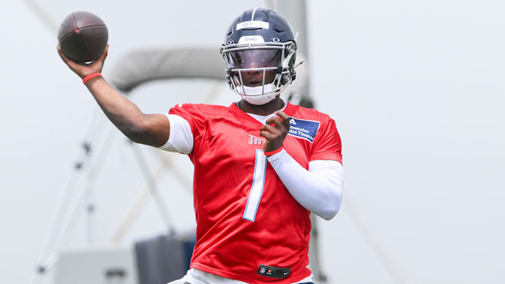May 10, 2025; Nashville, TN, USA;  Tennessee Titans quarterback Cam Ward (1) throws a pass as he goes through throwing drills during Rookie Mini Camp at Saint Thomas Sports Park. Mandatory Credit: Steve Roberts-Imagn Images