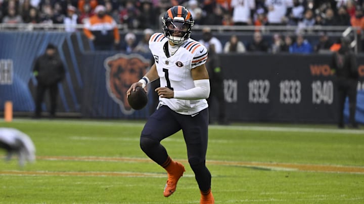 Dec 24, 2023; Chicago, Illinois, USA;  Chicago Bears quarterback Justin Fields (1) looks to pass