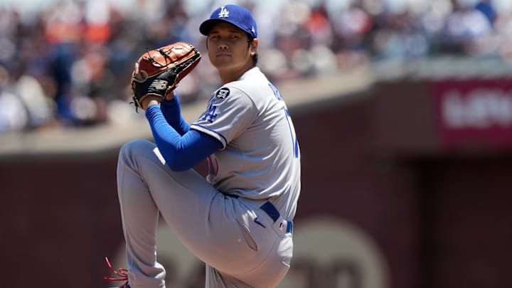 Jul 12, 2025; San Francisco, California, USA; Los Angeles Dodgers starting pitcher Shohei Ohtani (17) throws a pitch against the San Francisco Giants during the first inning at Oracle Park. Mandatory Credit: Darren Yamashita-Imagn Images Jul 12, 2025; San Francisco, California, USA; Los Angeles Dodgers starting pitcher Shohei Ohtani (17) throws a pitch against the San Francisco Giants during the first inning at Oracle Park. Mandatory Credit: Darren Yamashita-Imagn Images