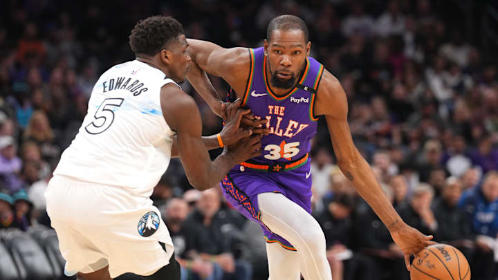 Mar 2, 2025; Phoenix, Arizona, USA; Phoenix Suns forward Kevin Durant (35) dribbles against Minnesota Timberwolves guard Anthony Edwards (5) during the second half at Footprint Center. Mandatory Credit: Joe Camporeale-Imagn Images Mar 2, 2025; Phoenix, Arizona, USA; Phoenix Suns forward Kevin Durant (35) dribbles against Minnesota Timberwolves guard Anthony Edwards (5) during the second half at Footprint Center. Mandatory Credit: Joe Camporeale-Imagn Images
