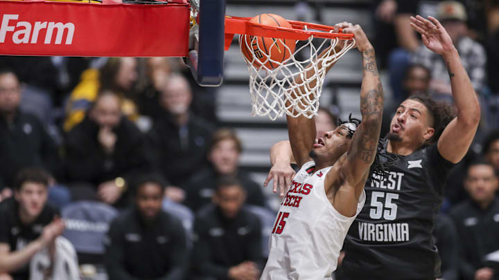 Texas Tech Red Raiders forward JT Toppin (15) dunks the ball during the first half against the West Virginia Mountaineers at Hope Coliseum.