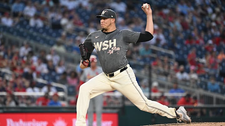 Jul 5, 2024; Washington, District of Columbia, USA; Washington Nationals relief pitcher Robert Garcia (61) throws a pitch against the St. Louis Cardinals during the sixth inning at Nationals Park. Jul 5, 2024; Washington, District of Columbia, USA; Washington Nationals relief pitcher Robert Garcia (61) throws a pitch against the St. Louis Cardinals during the sixth inning at Nationals Park.