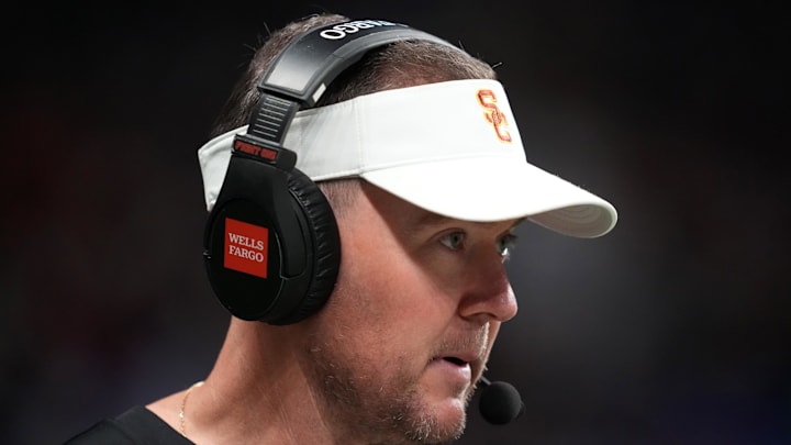 Dec 30, 2025; San Antonio, TX, USA; Southern California Trojans head coach Lincoln Riley watches in the first half against the TCU Horned Frogs during the Alamo Bowl at Alamodome. Mandatory Credit: Kirby Lee-Imagn Images