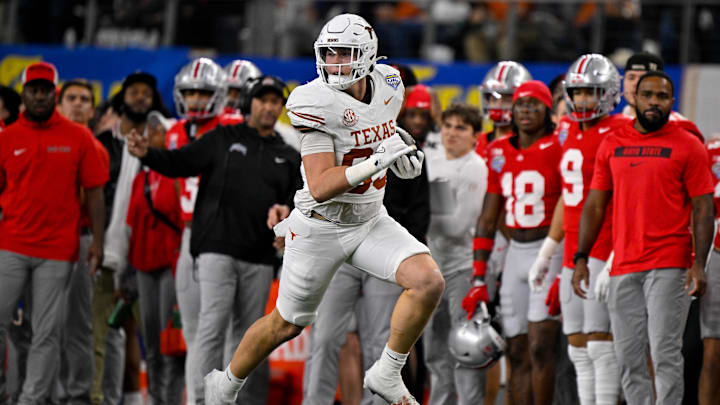 Jan 10, 2025; Arlington, TX, USA; Texas Longhorns tight end Gunnar Helm (85) in action during the game between the Texas Longhorns and the Ohio State Buckeyes at AT&T Stadium. Mandatory Credit: Jerome Miron-Imagn Images Jan 10, 2025; Arlington, TX, USA; Texas Longhorns tight end Gunnar Helm (85) in action during the game between the Texas Longhorns and the Ohio State Buckeyes at AT&T Stadium. Mandatory Credit: Jerome Miron-Imagn Images