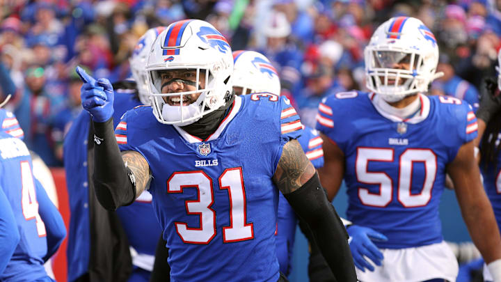 Bills safety Dean Marlowe celebrates his interception against Miami. Bills safety Dean Marlowe celebrates his interception against Miami.