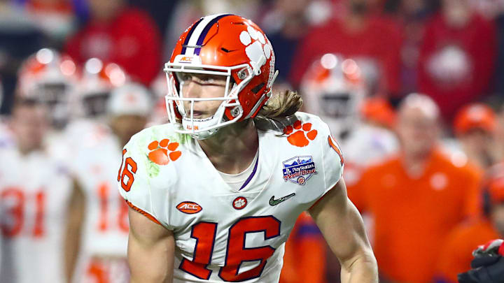Dec 28, 2019; Glendale, Arizona, USA; Clemson Tigers quarterback Trevor Lawrence (16) runs the ball against the Ohio State Buckeyes in the 2019 Fiesta Bowl college football playoff semifinal game. Mandatory Credit: Matthew Emmons-Imagn Images Dec 28, 2019; Glendale, Arizona, USA; Clemson Tigers quarterback Trevor Lawrence (16) runs the ball against the Ohio State Buckeyes in the 2019 Fiesta Bowl college football playoff semifinal game. Mandatory Credit: Matthew Emmons-Imagn Images