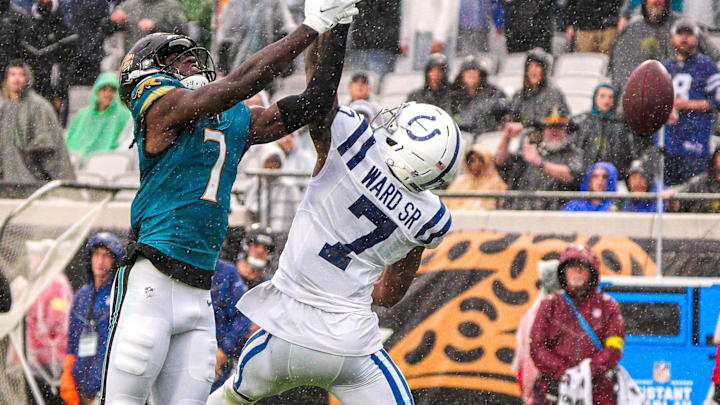 Jacksonville Jaguars wide receiver Brian Thomas Jr. (7) can’t hold onto a pass intended for him in the third quarter as Indianapolis Colts cornerback Charvarius Ward (7) defends him during an NFL football game at EverBank Stadium, Sunday, Dec. 7, 2025, in Jacksonville, Fla. Jaguars won 36-19[Doug Engle/Florida Times-Union]
