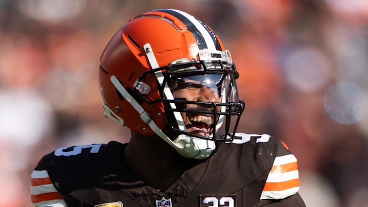 Nov 5, 2023; Cleveland, Ohio, USA; Cleveland Browns defensive end Myles Garrett (95) smiles as he celebrates a tackle for loss against the Arizona Cardinals during the first half at Cleveland Browns Stadium. Mandatory Credit: Scott Galvin-Imagn Images