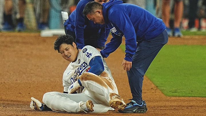 Ohtani injured his shoulder on an attempted stolen base during Game 2 of the World Series. Ohtani injured his shoulder on an attempted stolen base during Game 2 of the World Series.