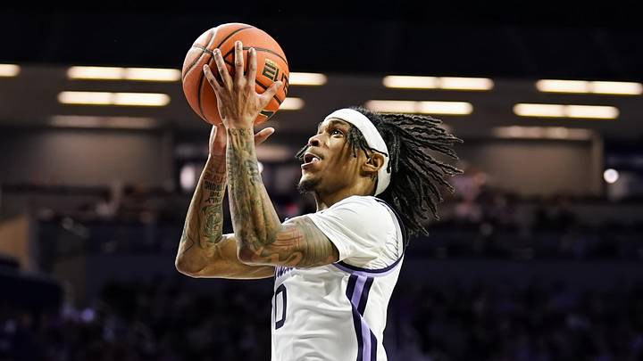 Dec 30, 2024; Manhattan, Kansas, USA; Kansas State Wildcats guard Dug McDaniel (0) shoots during the second half against the Cincinnati Bearcats at Bramlage Coliseum. Mandatory Credit: Jay Biggerstaff-Imagn Images Dec 30, 2024; Manhattan, Kansas, USA; Kansas State Wildcats guard Dug McDaniel (0) shoots during the second half against the Cincinnati Bearcats at Bramlage Coliseum. Mandatory Credit: Jay Biggerstaff-Imagn Images
