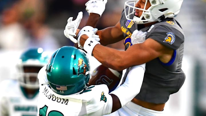 Dec 23, 2023; Honolulu, HI, USA; San Jose State Spartans wide receiver Nick Nash (3) and Coastal Carolina Chanticleers cornerback Matthew McDoom (16) fight for a pass during the third quarter of the Easypost Hawaii Bowl at Clarence T.C. Ching Athletics Complex. Mandatory Credit: Steven Erler-Imagn Images Dec 23, 2023; Honolulu, HI, USA; San Jose State Spartans wide receiver Nick Nash (3) and Coastal Carolina Chanticleers cornerback Matthew McDoom (16) fight for a pass during the third quarter of the Easypost Hawaii Bowl at Clarence T.C. Ching Athletics Complex. Mandatory Credit: Steven Erler-Imagn Images