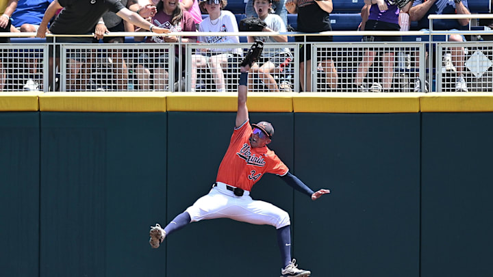 Jun 16, 2024; Omaha, NE, USA; Fans react to a catch by Virginia Cavaliers center fielder Harrison Didawick (34) against the Florida State Seminoles during the second inning at Charles Schwab Field Omaha. Mandatory Credit: Steven Branscombe-Imagn Images Jun 16, 2024; Omaha, NE, USA; Fans react to a catch by Virginia Cavaliers center fielder Harrison Didawick (34) against the Florida State Seminoles during the second inning at Charles Schwab Field Omaha. Mandatory Credit: Steven Branscombe-Imagn Images
