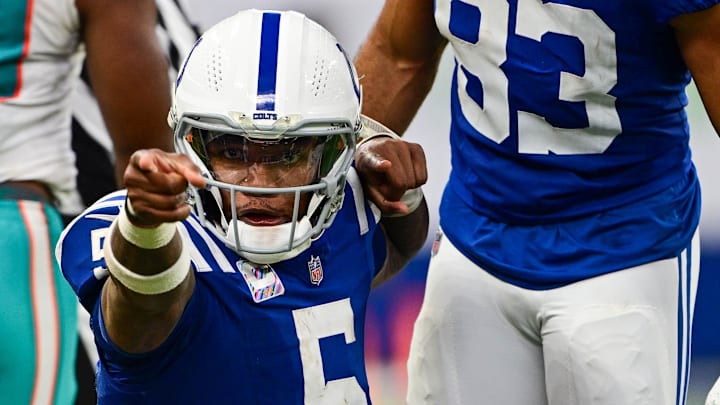 Indianapolis Colts quarterback Anthony Richardson (5) celebrates a first down during the second half against the Miami Dolphins at Lucas Oil Stadium. Indianapolis Colts quarterback Anthony Richardson (5) celebrates a first down during the second half against the Miami Dolphins at Lucas Oil Stadium.