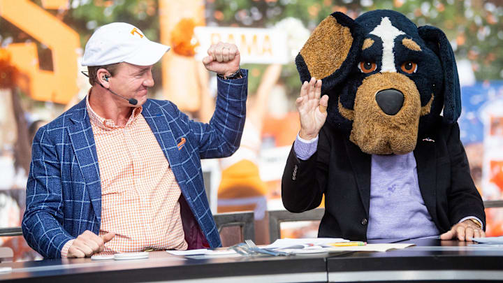 Peyton Manning fist pumps after Lee Corso chooses Tennessee to defeat Alabama during ESPN's College GameDay show held outside of Ayres Hall on the University of Tennessee campus in Knoxville, Tenn. on Saturday, Oct. 15, 2022. The college football pregame show returned to Knoxville for the second time this season for No. 8 Tennessee's SEC rivalry game against No. 1 Alabama.