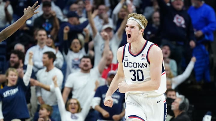 Dec 4, 2024; Storrs, Connecticut, USA; UConn Huskies forward Liam McNeeley (30) reacts after his three point basket against the Baylor Bears in the second half at Harry A. Gampel Pavilion. Mandatory Credit: David Butler II-Imagn Images