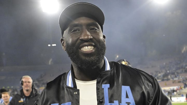 Nov 8, 2024; Pasadena, California, USA;  UCLA Bruins head coach DeShaun Foster leaves the field with the game ball after defeating the Iowa Hawkeyes at the Rose Bowl. Mandatory Credit: Jayne Kamin-Oncea-Imagn Images