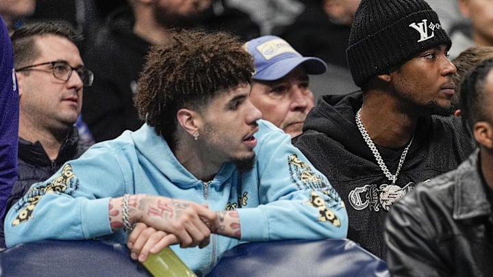 Feb 3, 2025; Charlotte, North Carolina, USA; Charlotte Hornets guard LaMelo Ball (1) and forward Brandon Miller (24) during the first half against the Washington Wizards at Spectrum Center. Mandatory Credit: Jim Dedmon-Imagn Images